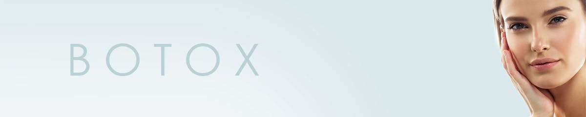 Young model holding her face in her hands